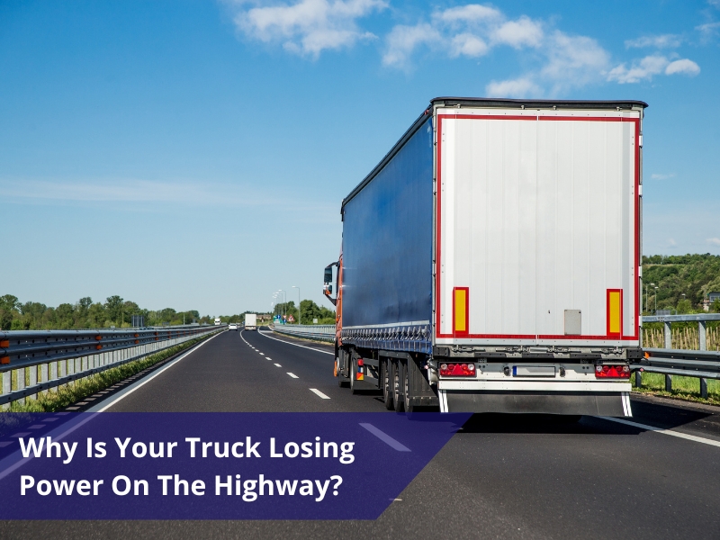 Truck on a highway facing performance issues, highlighting concerns about the truck losing power while driving.