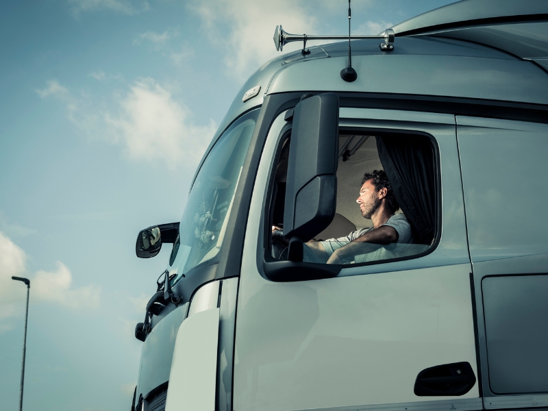 Becoming a truck driver involves mastering heavy vehicles like this large commercial transport truck.