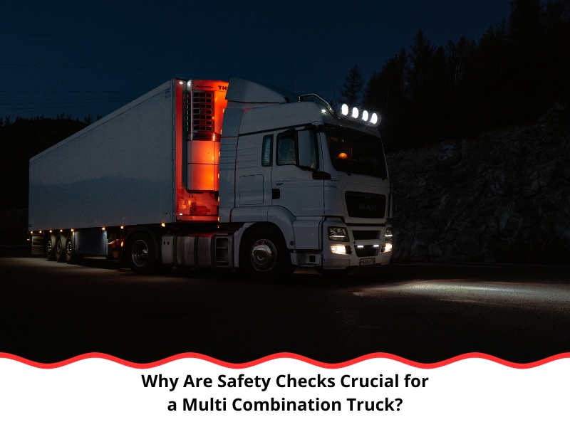 Night-time Multi Combination Truck parked on highway with headlights and refrigeration unit glowing red.
